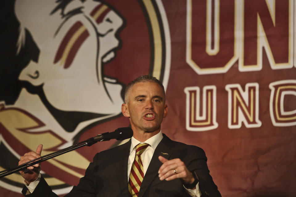 FILE - In this Dec. 8, 2019, file photo, Florida State head football coach Mike Norvell speaks at a press conference in Tallahassee, Fla. Florida State athletic director David Coburn says the football team met Thursday, June 4, 2020, after a star player accused coach Mike Norvell of lying about connecting personally last weekend with every player to discuss the killing of George Floyd and protests against racial injustice. (AP Photo/Phil Sears, File)