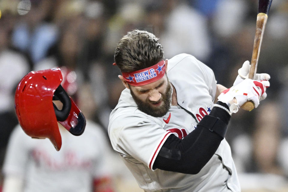 SAN DIEGO, CA - JUNE 25:  Bryce Harper #3 of the Philadelphia Phillies is hit with a pitch during the fourth inning of a baseball game against the San Diego Padres June 25, 2022 at Petco Park in San Diego, California. (Photo by Denis Poroy/Getty Images)