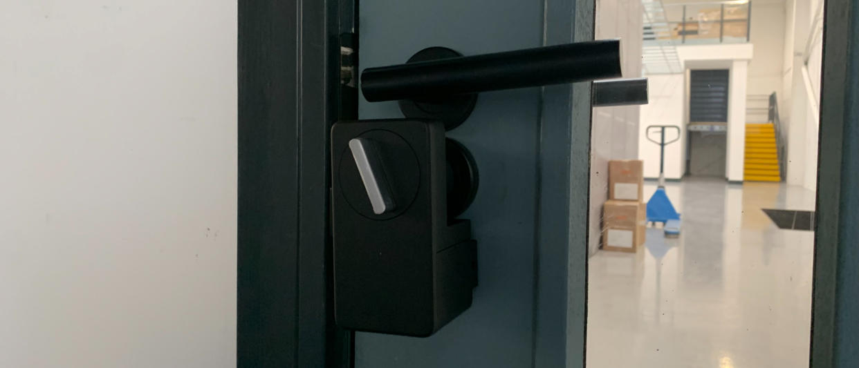  Switchbot lock installed on a door 