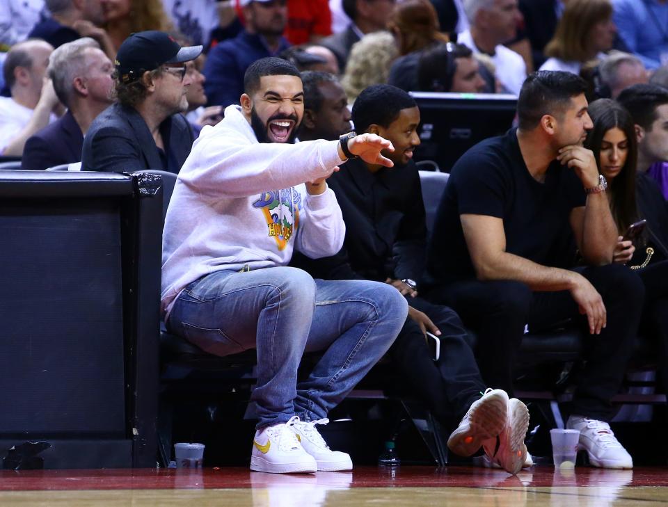 Singer Drake reacts in the second half during Game Five of the second round of the 2019 NBA Playoffs between the Philadelphia 76ers and the Toronto Raptors in 2019.