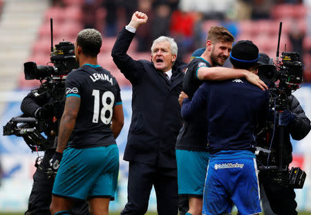 Soccer Football - FA Cup Quarter Final - Wigan Athletic vs Southampton - DW Stadium, Wigan, Britain - March 18, 2018 Southampton manager Mark Hughes celebrates after the match REUTERS/Phil Noble