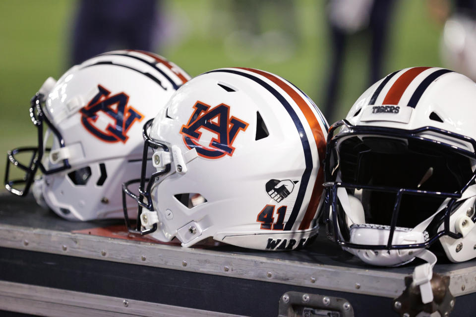 Oct 2, 2021; Baton Rouge, Louisiana; Auburn Tigers helmets sits on a crate during a game against LSU Tigers at Tiger Stadium. Stephen Lew-USA TODAY Sports