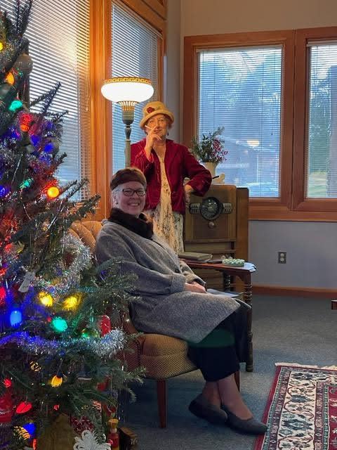 Hosting the “Christmas 1933” was Ann Lesar, Bonnie Peacock, and Josh Anderson (not pictured) whor are dressed in 1930’s attire at the Norris Museum's "Christmas 1933" event.