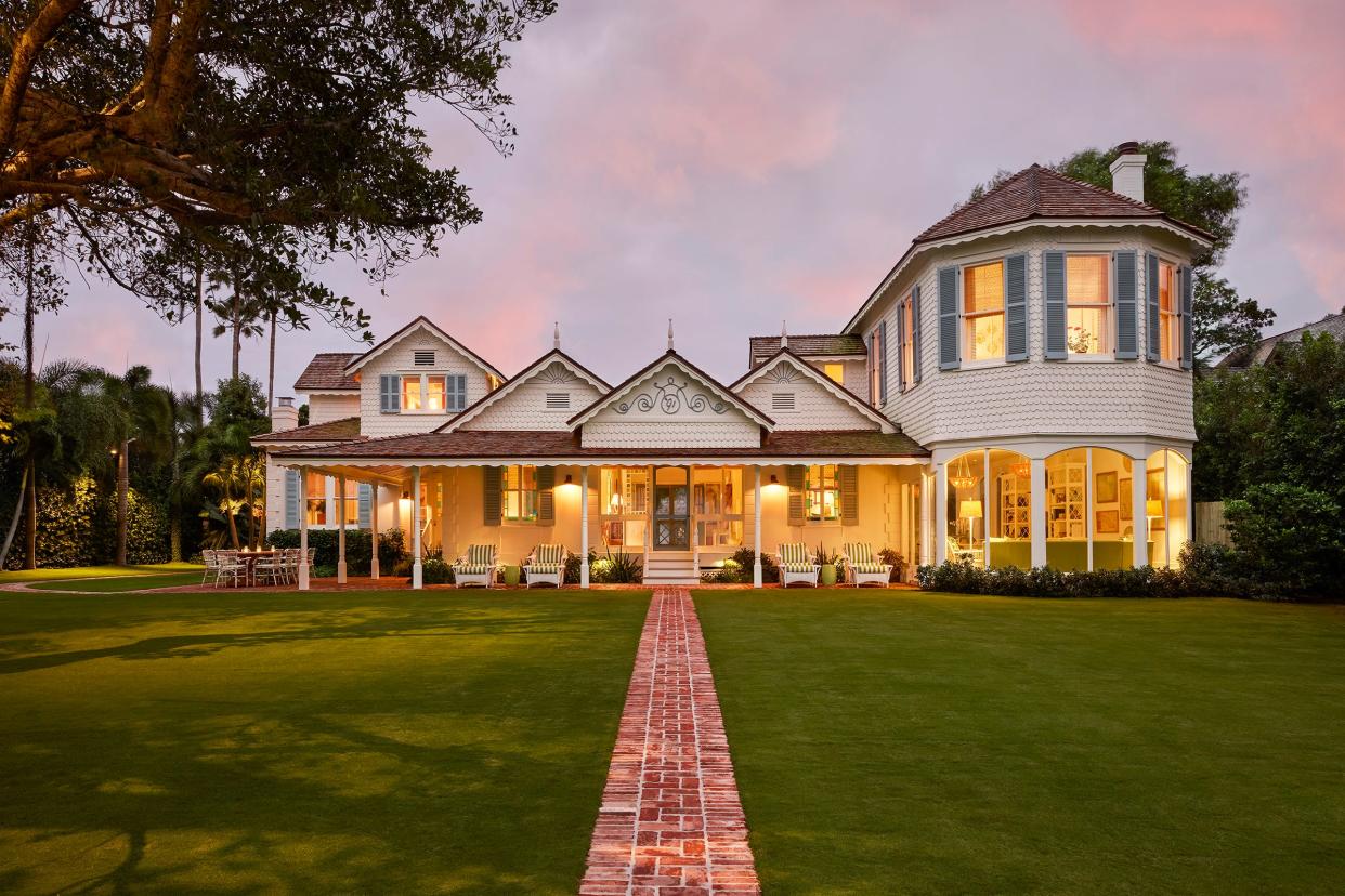 Viewed from the west at sunset, Duck’s Nest at 303 Maddock Way is the second-oldest house in Palm Beach. A restoration project by homeowners Julie and Brian Simmons earned the Preservation Foundation of Palm Beach 2020 Robert I. Ballinger Award.