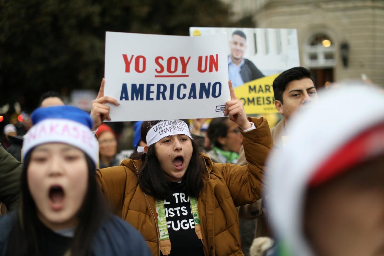 Protesters demonstrating in front of the Supreme Court as justices debate the Deferred Action for Childhood Arrivals programme: REUTERS