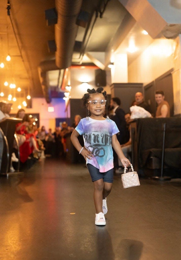 Fayetteville model Zuri Ealy, 3, walks the runway at the New York Fashion Week Magnifique show, Sept. 9 2023.