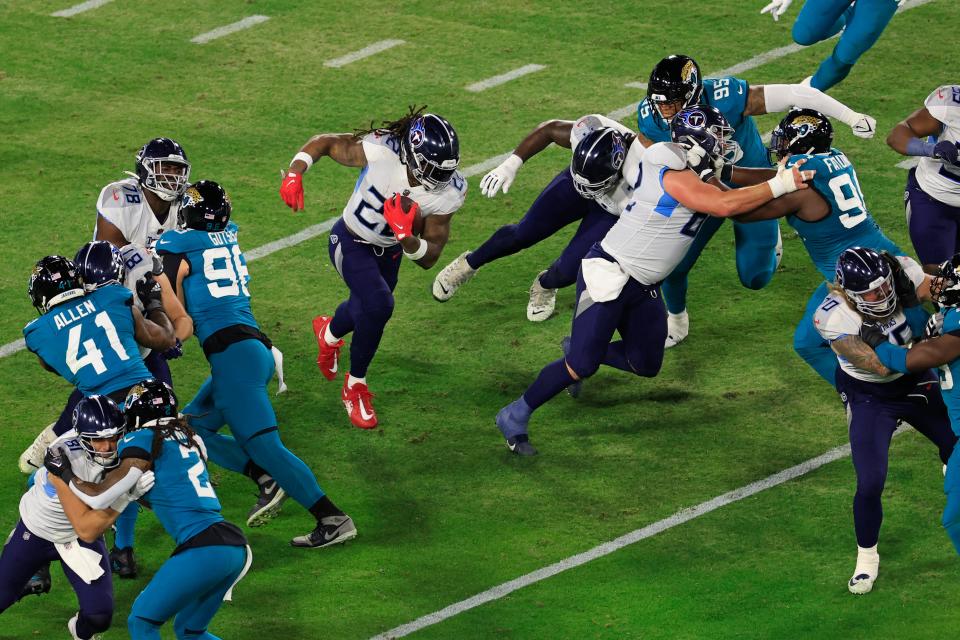 Tennessee Titans running back Derrick Henry (22), a Yulee High product, has rushed for 1,100 yards and 13 touchdowns in his last eight games against the Jacksonville Jaguars.