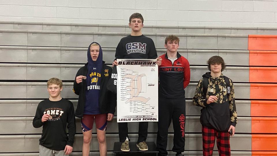 Jonesville junior Carson Playford (left) took fifth overall in the 138-weight class tournament at Leslie.