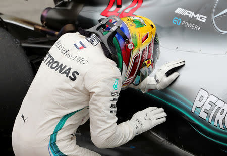 Formula One F1 - Brazilian Grand Prix - Autodromo Jose Carlos Pace, Interlagos, Sao Paulo, Brazil - November 11, 2018 Mercedes' Lewis Hamilton celebrates after winning the race REUTERS/Paulo Whitaker