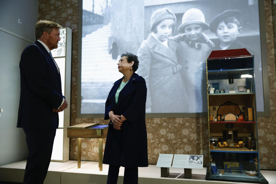 Netherlands' King Willem Alexander, left, tours the National Holocaust Museum in Amsterdam, Netherlands, Sunday, March 10, 2024. The Netherlands's National Holocaust Museum is opening on Sunday in a ceremony presided over by the Dutch king as well as Israeli President Isaac Herzog, whose presence is prompting protest because of Israel's deadly offensive against Palestinians in Gaza. (Piroschka van de Wouw/Pool Photo via AP)
