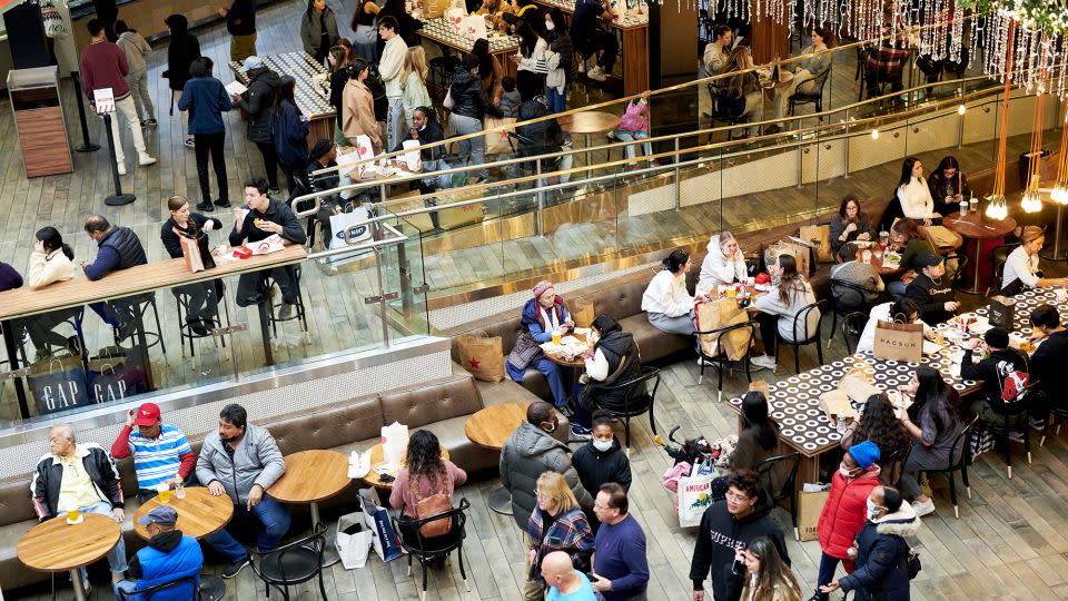 Shoppers eat at a food court at the Westfield Garden State Plaza mall on Black Friday in Paramus, New Jersey, in November 2021. - Gabby Jones/Bloomberg/Getty Images