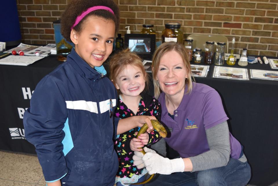 Andrea Miehls, right, is a communications associate for the Great Lakes Fishery Commission. She will talks about the devastating effects of sea lampreys on Great Lakes fisheries at the Cheboygan Library.