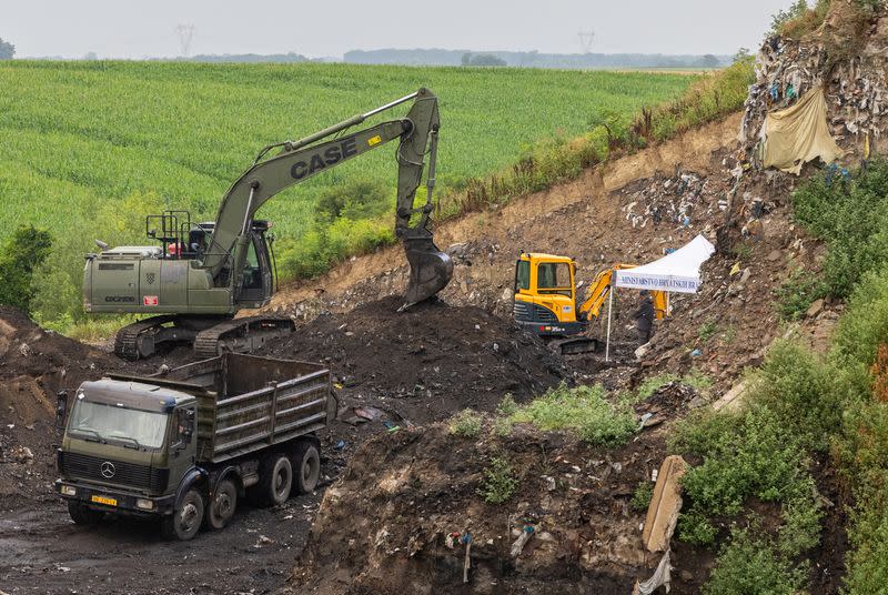 Military is seen digging at Petrovacka dola garbage yard where a new mass grave was found from the Croatian War of Independence in Vukovar