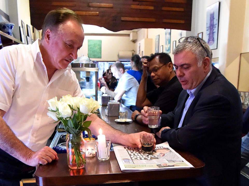 A coffee and newspaper is placed on the bar where Pellegrini’s co-owner Sisto Malaspina would have sat. Image: AAP