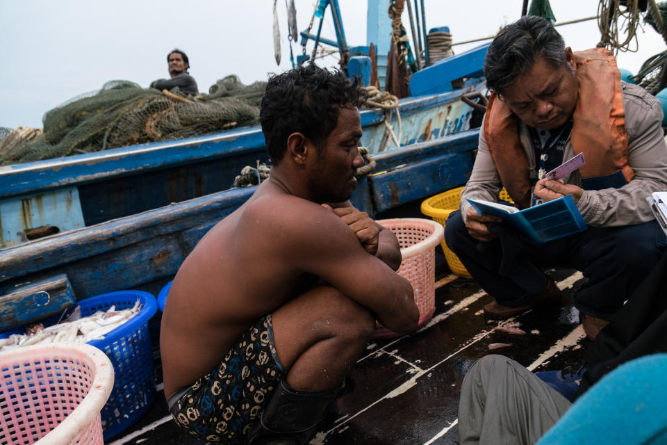 A Cambodian worker on a Thai fishing ship.