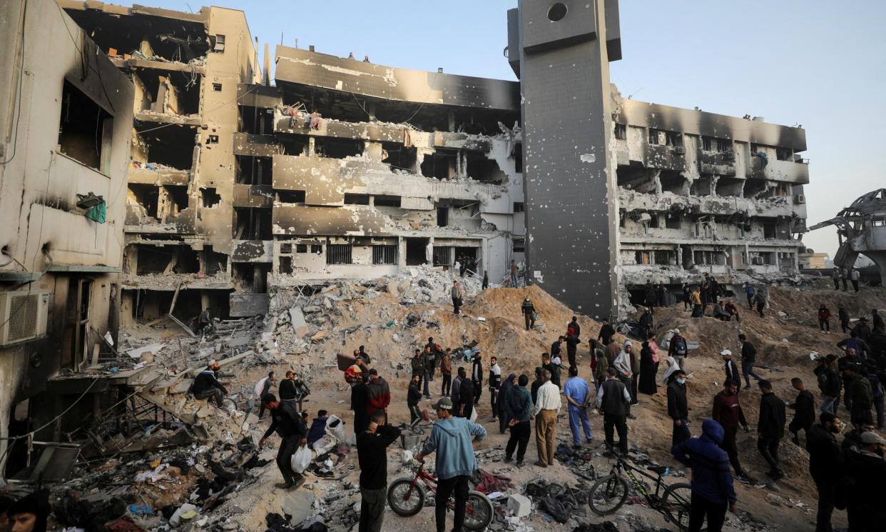 <span>Palestinians inspect damages at Al Shifa Hospital after Israeli forces withdrew from the hospital and the area around it following a two-week operation, amid the ongoing conflict between Israel and Hamas, in Gaza City April 1, 2024.</span><span>Photograph: Dawoud Abu Alkas/Reuters</span>