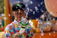 A staff member attends the opening event of Disney-Pixar Toy Story Land, the seventh themed land at Shanghai Disneyland, in Shanghai, China April 26, 2018. REUTERS/Aly Song