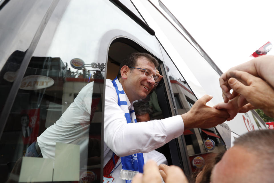 In this Friday, June 21, 2019 file photo, Ekrem Imamoglu, candidate of the secular opposition Republican People's Party, or CHP, waves to supporters during a rally in Istanbul, ahead of the June 23 re-run of Istanbul elections. Voters in Istanbul return to the polls on Sunday for a rerun of the election for the mayor of the city. (AP Photo/Lefteris Pitarakis, File)