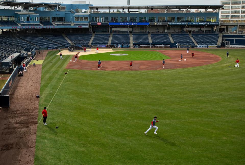 WooSox players take to the field on media day at Polar Park Wednesday.