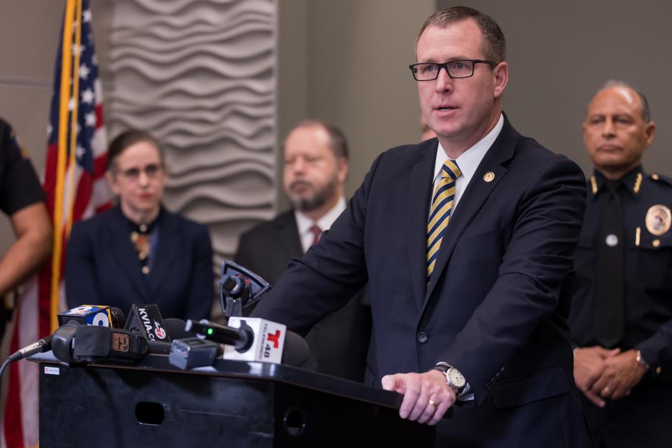 FBI Special Agent in Charge Jeffrey Downey joins other law enforcement agencies as they discuss school threats at a news conference at the El Paso Regional Communications Center on Tuesday.