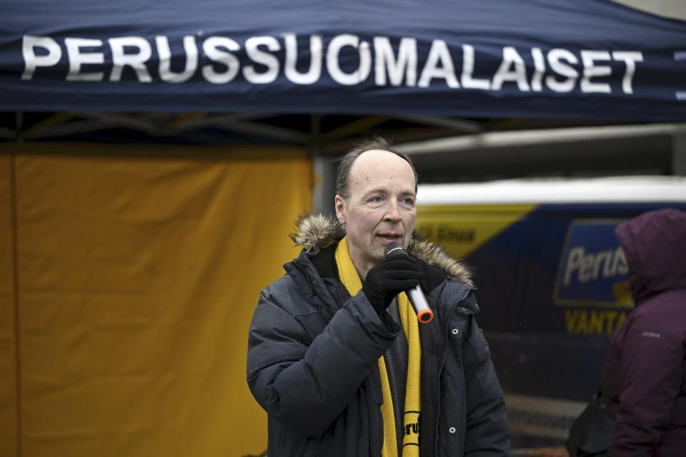 Finns Party presidential candidate Jussi Halla-aho campaigns at a market in Vantaa, Finland on October 28, 2023. The first round of the Finnish presidential election will take place on January 28. (Antti Aimo-Koivisto/Lehtikuva via AP)