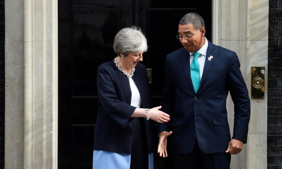 Theresa May and Jamaica’s PM Andrew Holness.