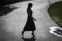 First Lady Melania Trump walks to meet President Donald Trump before boarding Marine One from the South Lawn of the White House on August 7, 2019 in Washington, DC. (Photo by Oliver Contreras/SIPA USA)