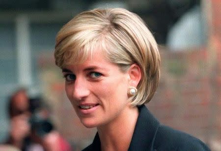 FILE PHOTO - Princess Diana arrives at the Royal Geographical Society in London for a speech on the dangers of landmines throughout the world June 12, 1997. REUTERS/Ian Waldie