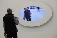 A man looks 'Mirror No. 12' by Daniel Rozin during a press day to promote the upcoming exhibition 'From Selfie to Self-Expression' at the Saatchi Gallery in London, Britain March 30, 2017. REUTERS/Stefan Wermuth