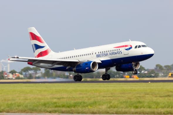 AMSTERDAM - JULY 31: British Airways Airbus A318 arriving at Schiphol on July 31, 2014 Amsterdam, The Netherlands. British Airwa