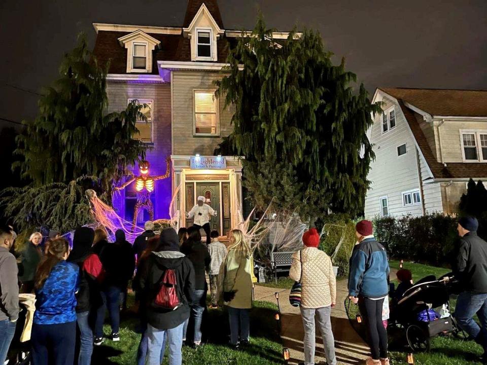 Guests listen to the ghost of Ernest Tyree, one of Cranford's featured legends.