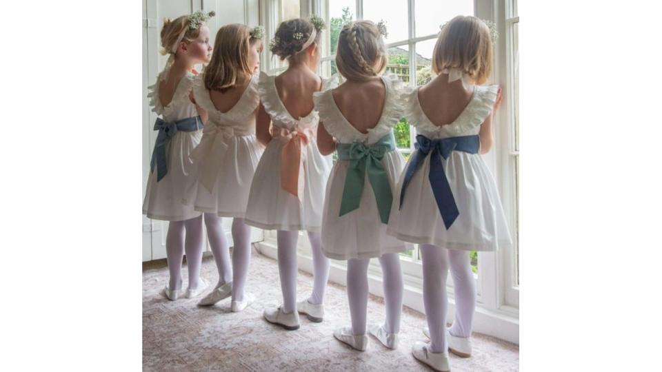 Flower girl dresses with bows by Smock London