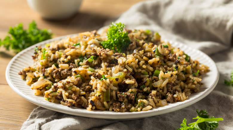 Cajun dirty rice piled on a plate