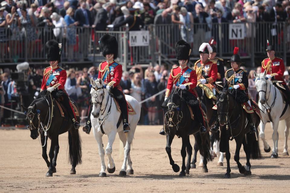 <p>Some of the Queen's children arriving on horseback during the parade.</p>