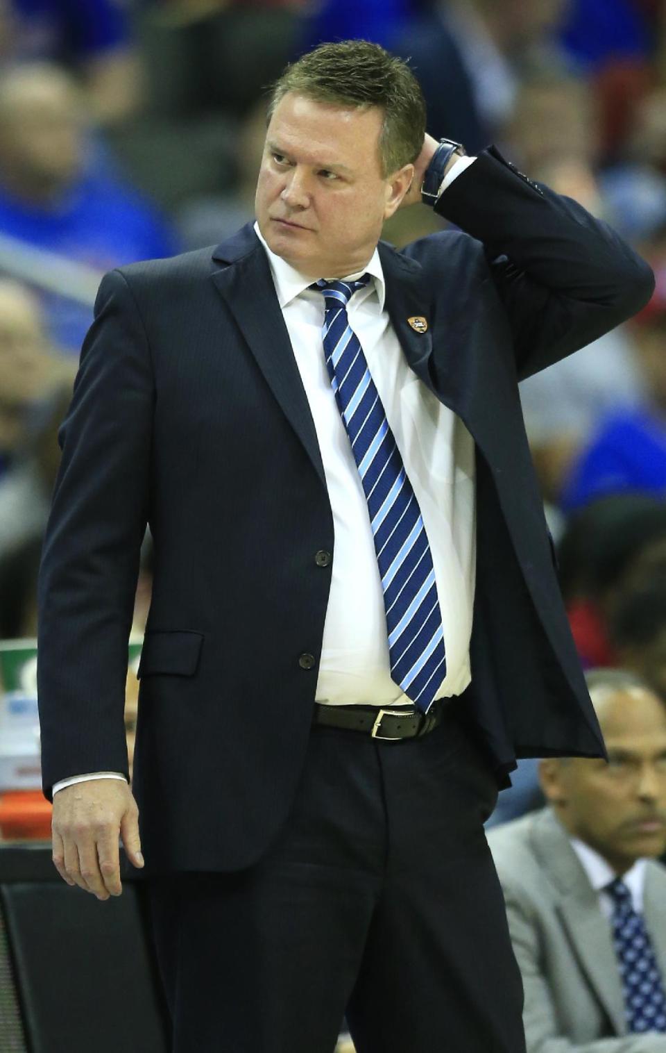 Kansas head coach Bill Self scratches his head during second half of an NCAA college basketball game against TCU in the quarterfinal round of the Big 12 tournament in Kansas City, Mo., Thursday, March 9, 2017. TCU defeated Kansas 85-82. (AP Photo/Orlin Wagner)