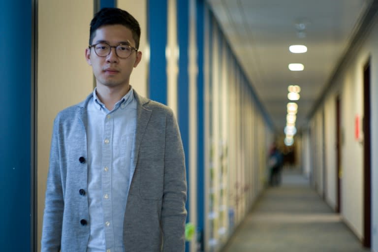 In this picture taken on June 22, 2017, Hong Kong's youngest lawmaker and former Umbrella Movement leader Nathan Law poses during an interview with AFP at his Legco office in Hong Kong