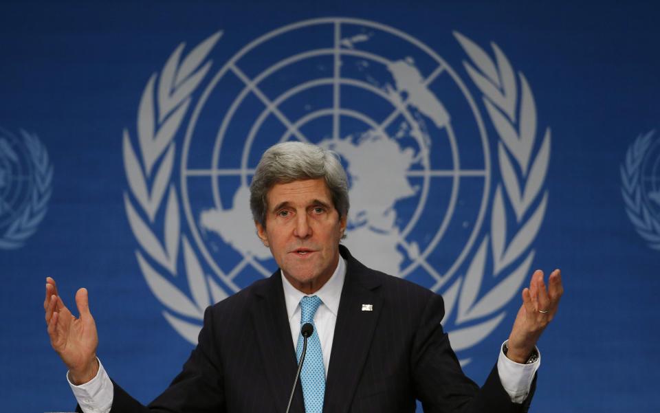 U.S. Secretary of State John Kerry addresses a news conference after the Geneva-2 peace talks in Montreux January 22, 2014. Kerry on Wednesday left the door open for Iran to participate in Syrian peace talks, saying Tehran could make a difference in ending the conflict. (REUTERS/Arnd Wiegmann)