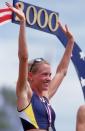 16 Jul 2000: Suzy Favor Hamilton of the USA celebrates on the winners podium after the Women's 1,500 meter event of the 2000 U.S. Olympic Track & Field Team Trials at the Hornet Stadium in Sacramento, California.Mandatory Credit: Andy Lyons /Allsport