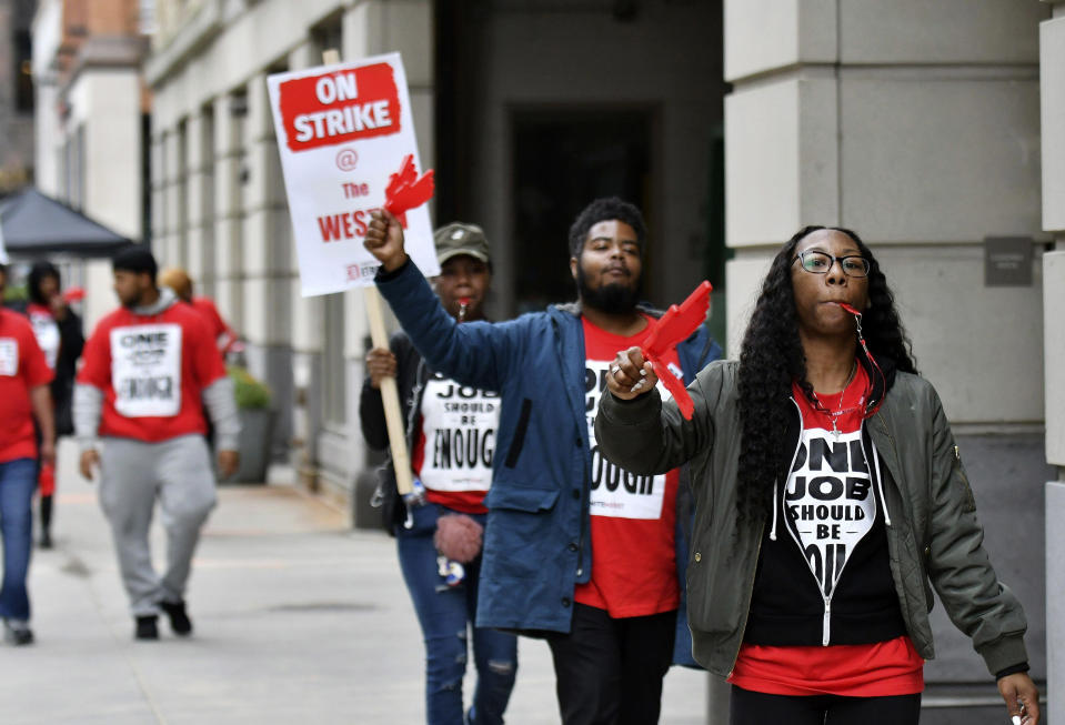 Workers from Unite Here Local 24 demonstrate at the Westin Book Cadillac in Detroit on Sunday. (AP)