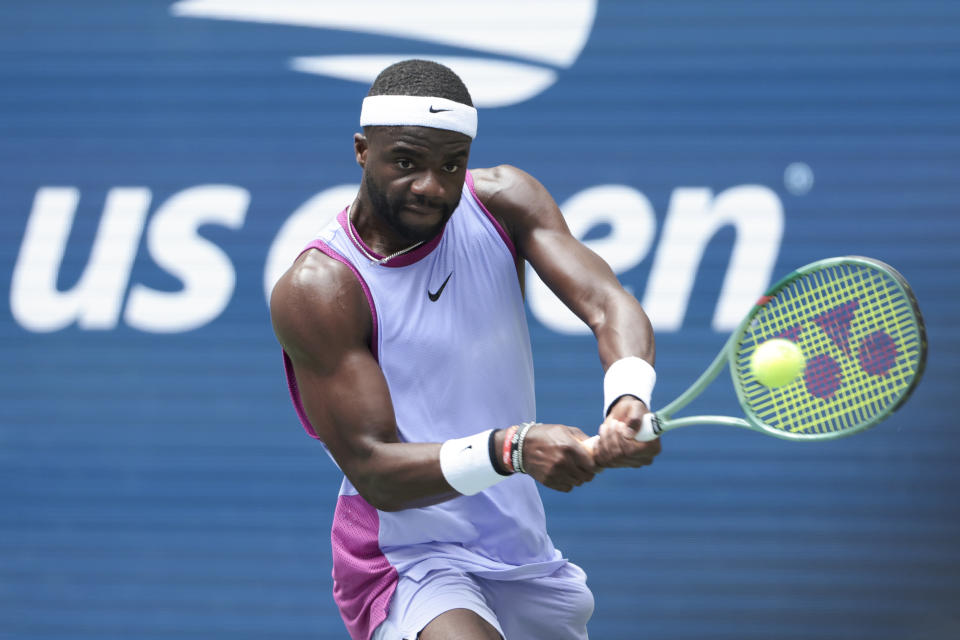 NEW YORK, NEW YORK - AUGUST 30: Frances Tiafoe of USA against Ben Shelton of USA during their Men's Singles Third Round match on Day Five of the 2024 US Open at USTA Billie Jean King National Tennis Center on August 30, 2024 in the Flushing neighborhood of the Queens borough of New York City.  (Photo by Jean Catuffe/Getty Images)