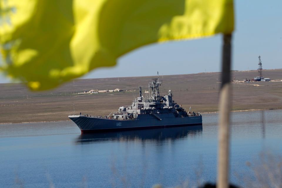 A Ukrainian flag hovers above the then-Ukrainian naval landing vessel, Konstantin Olshansky
