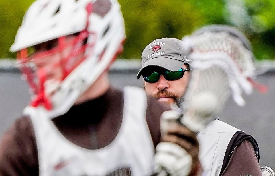 Brown head coach Mike Daly watches over Wednesday's practice. Brown will host Virginia on Saturday night in the NCAA tournament.