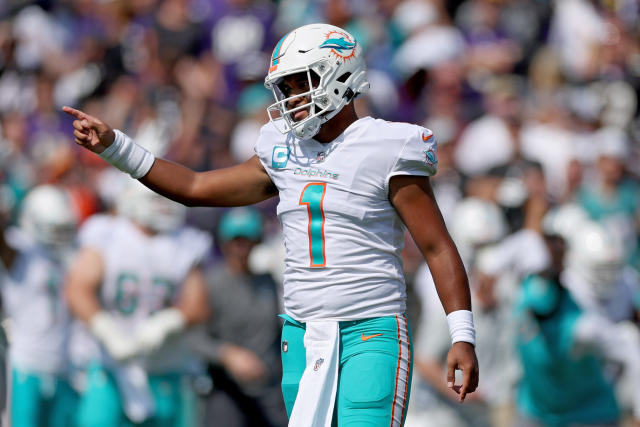 BALTIMORE, MARYLAND - SEPTEMBER 18: Tua Tagovailoa #1 of the Miami Dolphins celebrates a touchdown in the second quarter during an NFL game against the Baltimore Ravens at M&amp;T Bank Stadium on September 18, 2022 in Baltimore, Maryland. (Photo by Patrick Smith/Getty Images)