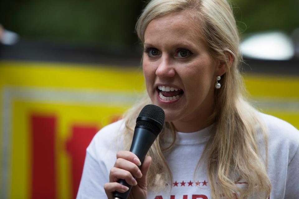 Then-Republican U.S. Senate candidate Lauren Witzke speaks during an anti-abortion protest in front of the home of presidential candidate Joe Biden on Oct. 1, 2020, in Greenville, Del.