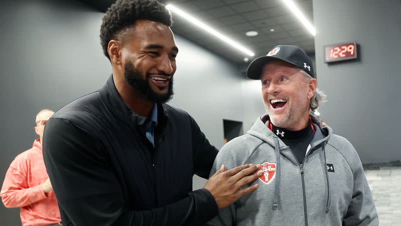 Former University of Utah football player Nate Orchard talks with University of Utah football coach Kyle Whittingham during the Crimson Collective launch event at the Rice-Eccles Stadium in Salt Lake City on Friday, April 21, 2023. The Crimson Collective is an independent NIL organization and the exclusive NIL collective for Utah football.