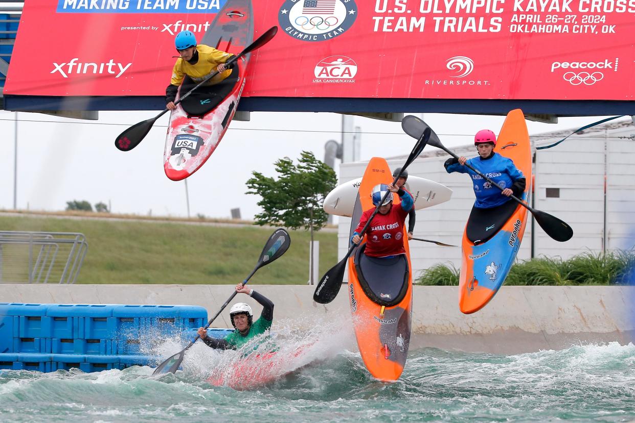 Athletes compete in kayak cross during 2024 Olympic Team Trials for Canoe/Kayak Slalom and Kayak Cross at the RIVERSPORT Whitewater Center in Oklahoma City, Saturday, April 27, 2024.