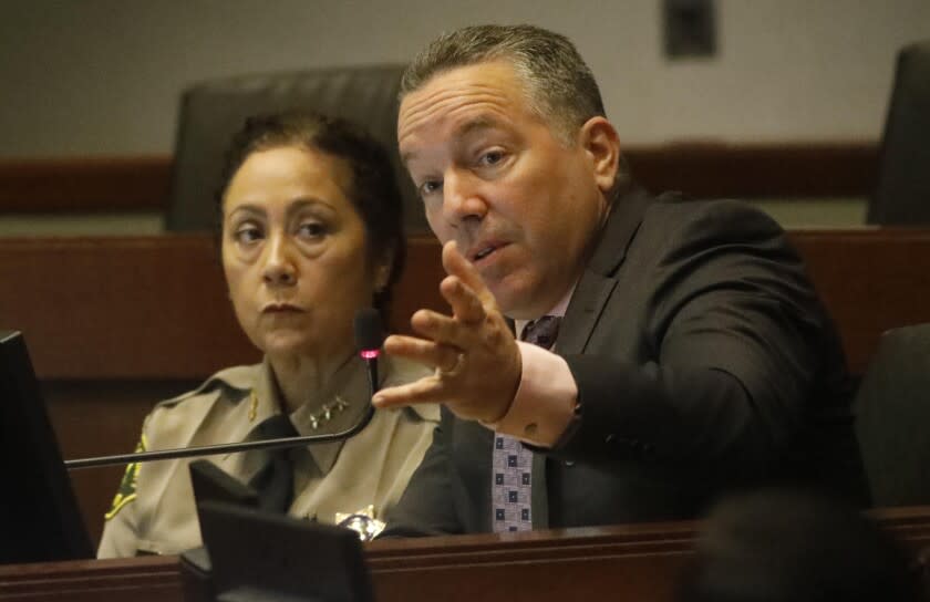 LOS ANGELES, CA - MARCH 26, 2019 - - Sheriff Alex Villanueva, right, addresses the issue of Secret Deputy Sub-groups as new Assistant Sheriff Robin Limon looks on during the Sheriff Civilian Oversight Commission at the Metropolitan Transit Authority in Los Angeles on March 26, 2019. "My job is to strike a careful balance," Villanueva said. ""Our job is public safety," he concluded. In a letter last week, the COC criticized Sheriff Villanueva, saying the department has engaged in "dissembling and stonewalling" when it comes to handing over documents related to cliques. The meeting comes at a time when Villanueva is facing criticism from several fronts, including from the Board of Supervisors, which went to court to try to stop him from reinstating a fired deputy. (Genaro Molina/Los Angeles Times)