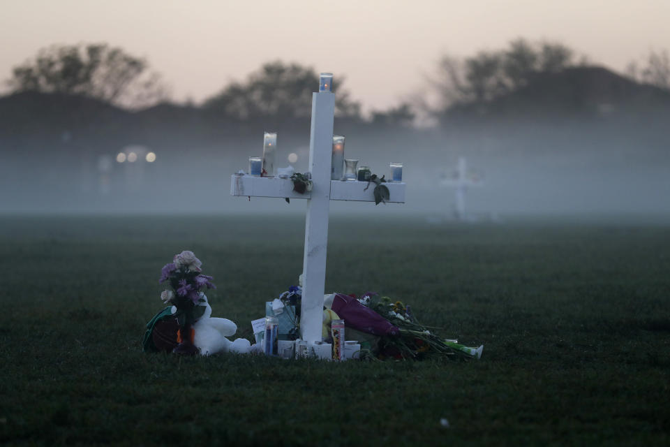 <p> An early morning fog rises where 17 memorial crosses were placed, for the 17 deceased students and faculty from the Wednesday shooting at Marjory Stoneman Douglas High School, in Parkland, Fla., Saturday, Feb. 17, 2018. As families began burying their dead, authorities questioned whether they could have prevented the attack at the high school where a gunman, Nikolas Cruz, took several lives. (AP Photo/Gerald Herbert) </p>
