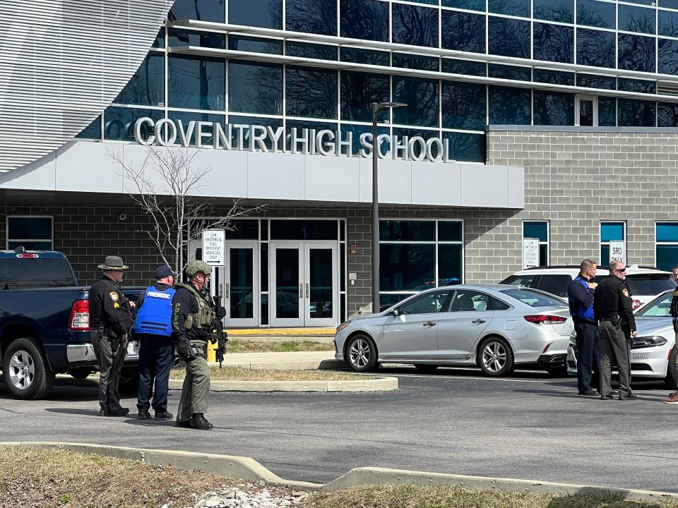 Law enforcement outside Coventry High School in Akron, Ohio, following an apparent school shooting hoax