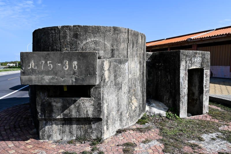 A decommissioned bunker sits empty near a wharf in Zhuwei, located near Taoyuan Airport. Photo by Thomas Maresca/UPI